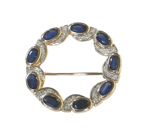 Брошь из красного золота с сапфирами и бриллиантами